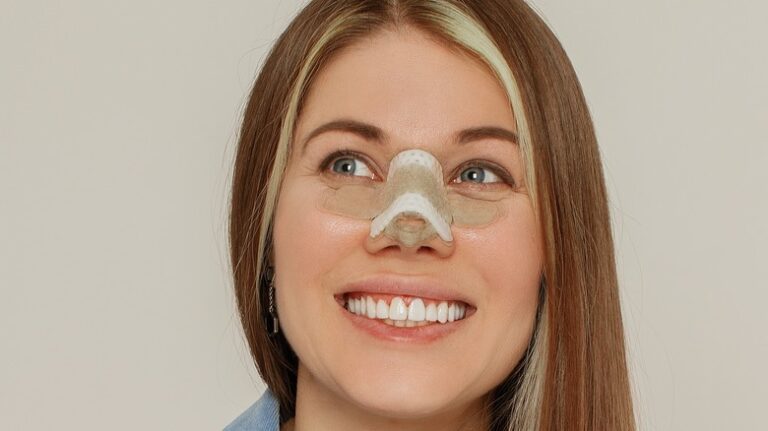 A,Young,Beautiful,Woman,With,A,Bandage,On,Her,Nose