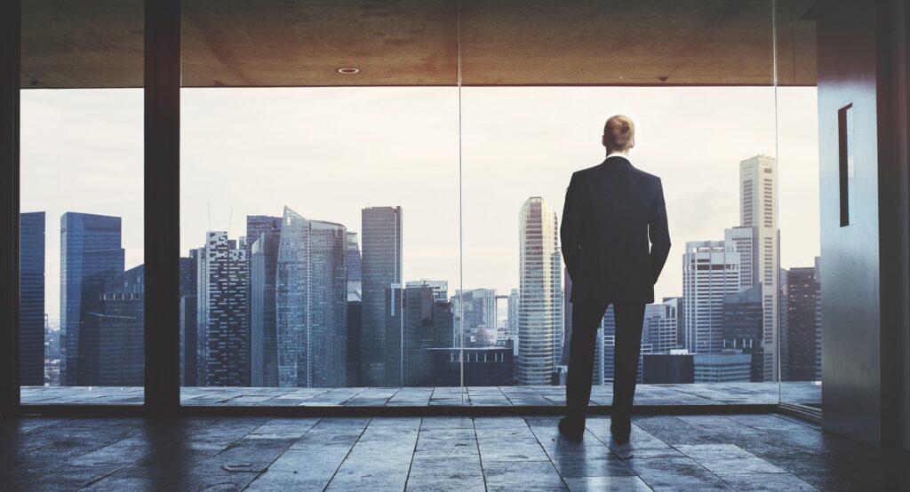 Businessman looking at city