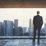 Businessman looking at city