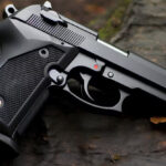 close-up-gun-ground_23-2150803574