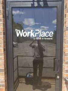 Vinyl-sign-of-workplace-on-door
