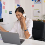 medium-shot-woman-working-travel-agency
