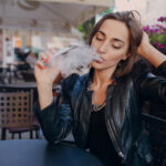 adult-touching-her-head-while-smoking_1157-448 (1)