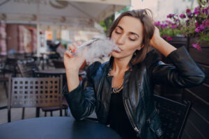 adult-touching-her-head-while-smoking_1157-448 (1)