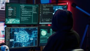 “Cybersecurity professional analyzing threat data on multiple screens”