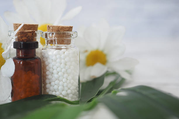 Homeopathy alternative medicine bottle on a table ,