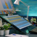 Close up of retouching app on computer in empty studio