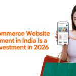 Ecommerce website development India concept showing online shopping mobile app with user holding smartphone and shopping bags