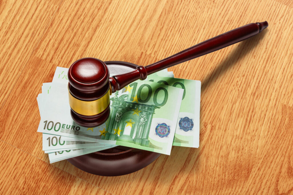 Wooden,Judge's,Gavel,And,One,Hundred,Euro,Banknotes