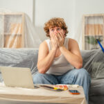 Man feeling stress and anxiety during home renovation