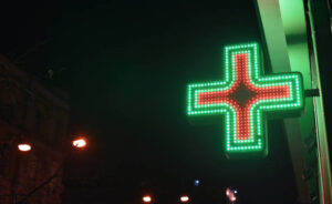 sign of pharmacy in night street