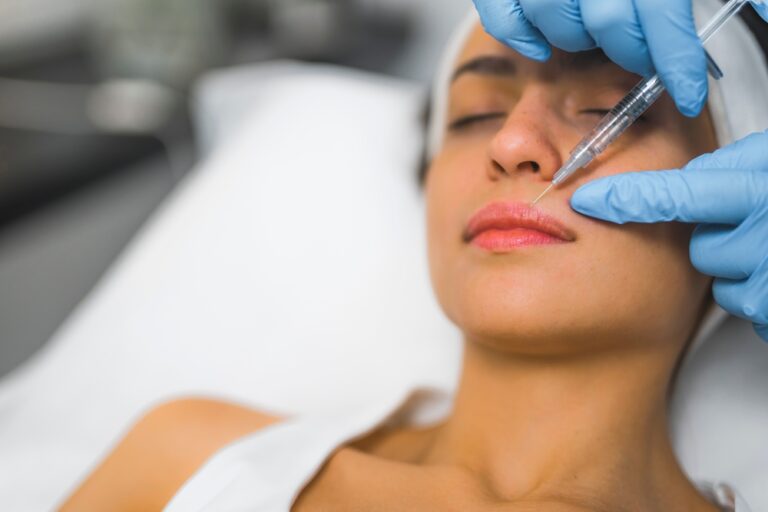 Extreme,Closeup,Indoor,Shot,Showing,Lip,Filler,Procedure,At,Spa