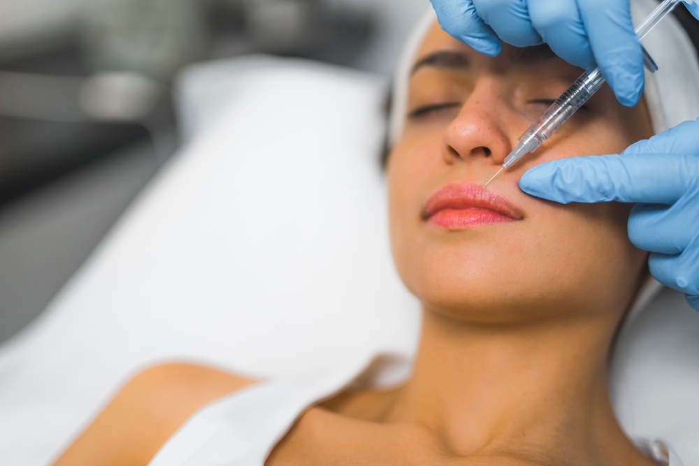 Extreme,Closeup,Indoor,Shot,Showing,Lip,Filler,Procedure,At,Spa