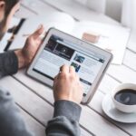worker-reading-news-with-tablet (2)