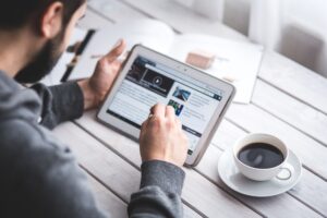 worker-reading-news-with-tablet (2)