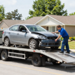 magnific__professional-flatbed-tow-truck-loading-a-brokendow__86501