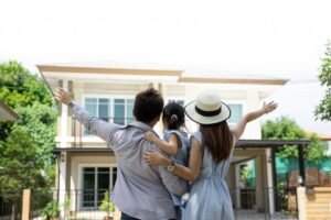 happy-asian-family-father-mother-daughter-near-new-home-real-estate_36356-245